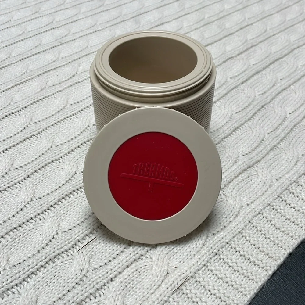VTG Thermos tan with red accented lid. Model # 1155. Insulated jar. Threaded lid
